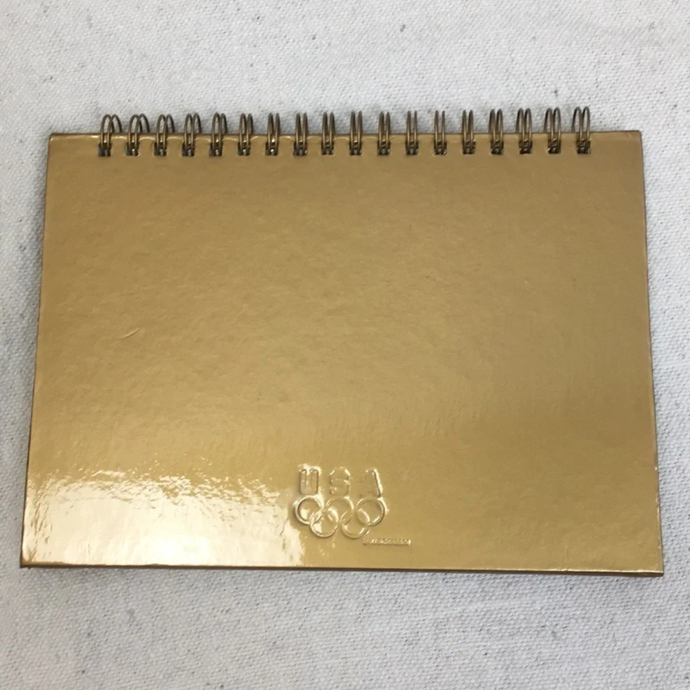 Spiral bound Olympic photo album/frame